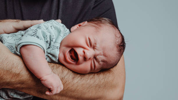 Mother holding baby during quiet New Year moment
